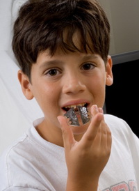 Boy With Retainer at Pediatric Dentist Office in Clarks Summit